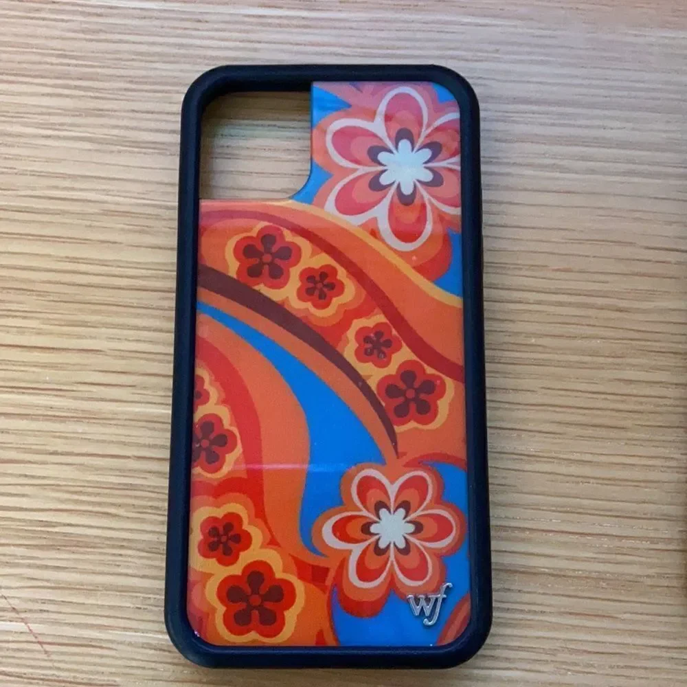 Various IPhone 11 cases including wallflower case